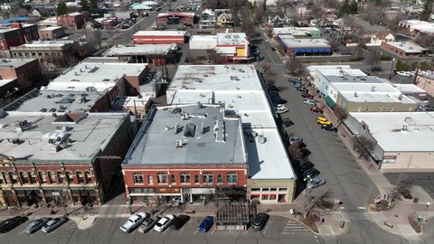 Cinematic 4K aerial drone footage of old historical buildings downtown, in the city of Ellensburg, Kittitas County in Western Washington