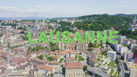 Inscription on video. Lausanne, Switzerland. Cathedral of Lausanne. La Cite is a district historical centre. Text furry, Aerial View, Point of interest