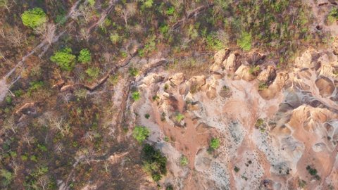 Aerial view of Natural disasters in tourist attractions, soil and rock layers, and the nature of mountains are eroded by rain. Footage b roll 4k aerial view.