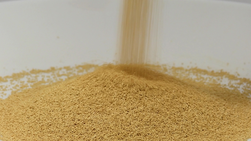 
dry yeast falling down on a turn table | Shutterstock HD Video #1089050267