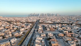 Doha, Qatar: Aerial view of capital city of Qatar, cityscape with skyscrapers skyline of West Bay site on horizon - landscape panorama of Arabian Peninsula from above, West Asia