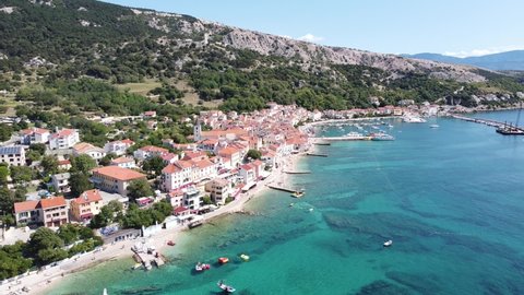 Baska Beach, Krk island, Croatia - Aerial Drone View of the Coastline with Boulevard, Harbor and Clear Blue Adriatic Sea during Summer Holiday