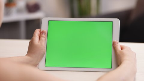 Tablet Computer with Green Screen and Chroma Key for Copy Space. Chromakey Mock Up with Modern Device. Business Woman Holding Mobile PC Close-Up. Office Worker Shopping at Web Store or Working on Pad