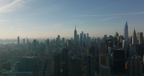 Aerial panoramic view of high rise office or apartment buildings in midtown. One Vanderbilt, Chrysler and Empire State Building. Manhattan, New York City, USA in 2021