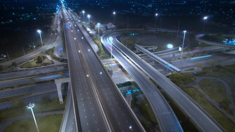 4K UHD : Stunning Aerial time lapse in motion drone shot of freeway and interstate traffic. cars and light streaks. hyperlapse traffic
