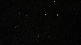 Closeup water rainfall, rain drops falling on window glass over black background - Powered by Shutterstock - Get 15% off with code: PIKWIZARD15