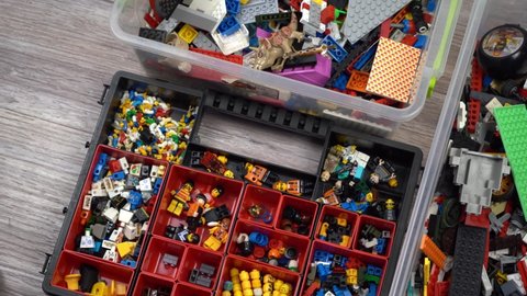 Lego. Children's toy constructor. Lots of colorful details. Blocks and bricks for playing and building. Educational toy. Lego figures. Sorting and storage. Play. Kyiv, Ukraine - March 30, 2022.