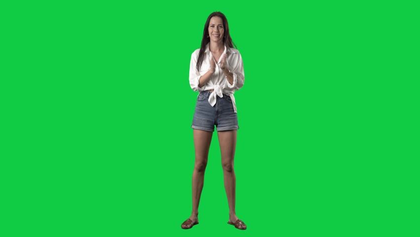 Excited cheering young pretty woman applauding enthusiastic. Full body isolated on green screen background Royalty-Free Stock Footage #1089084993