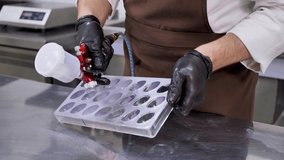 Waitress is a woman wearing a face mask and holding an infrared thermometer on her forehead to check the body temperature for symptoms of the virus in customers. - Powered by Shutterstock - Get 15% off with code: PIKWIZARD15