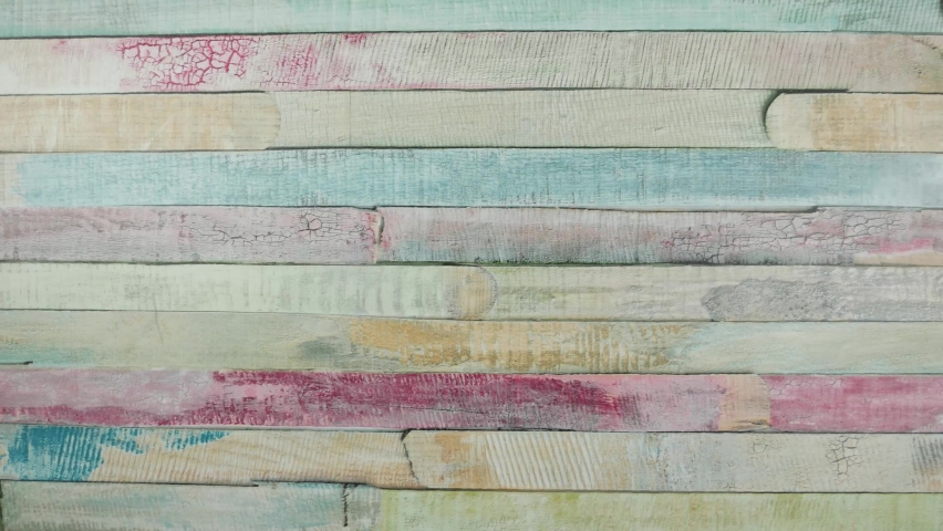 Red round jelly cake cut into pieces, which are taken away. Stop motion