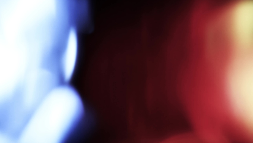 Light leaks 4k footage on black background. Natural lighting lamp rays bokeh effect. Light organic leaks effect background animation stock footage. 