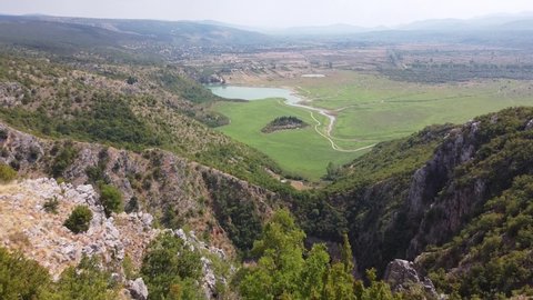 Krenica Lake and Prolosko Blato at Mainland of Dalmatia Split, Croatia - Aerial Drone View (Revealing)