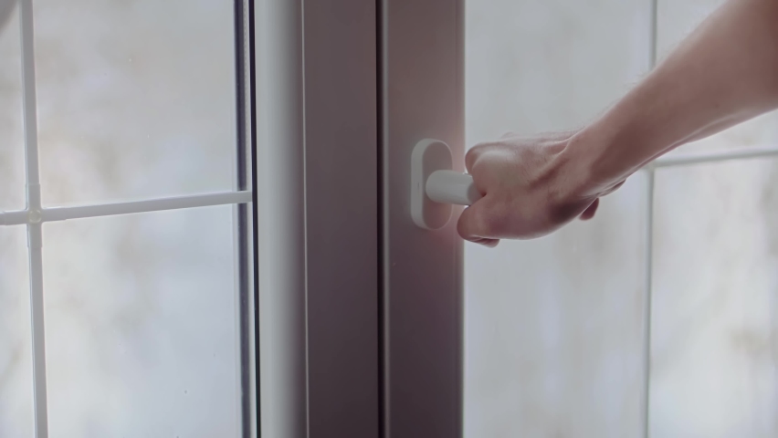 Man Hand Open Closed Window White Plastic Pvc. Hands Opening Plastic Windows In Morning For Fresh Air Ventilation. Light Apartment Room In Winter. Open Vinyl Frame In Bright Room Interior. Airing Home