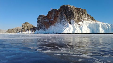 Frozen Lake Baikal, Olkhon Island, Rock cape. Siberia, Russia, 4k