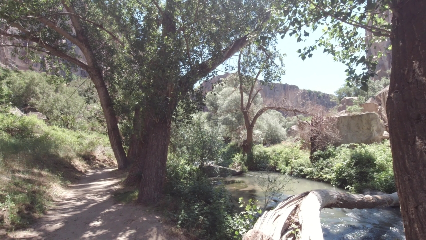 Ihlara Vadisi or Ihlara Valley in Aksaray Turkey. POV 4K video. Travel to Turkey background footage.