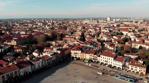 Aerial view of Padua in northern Italy. Drone view of Prato della Valle. A canal in the shape of an ellipse around the central part of the square. Bridges over the canal and a double row of statues
