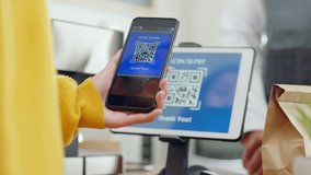 Customer using phone for payment at cafe restaurant, cashless QR code technology and money transfer concept - Powered by Shutterstock - Get 15% off with code: PIKWIZARD15