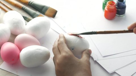 painting on a white color egg 
