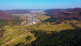 Aerial view around the city Albstadt in Germany in the black forest on a sunny day in early spring.