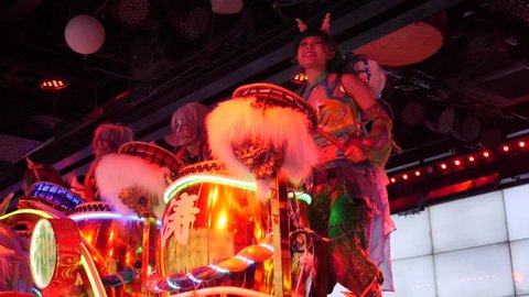 Tokyo, Japan - April 23, 22: Famous robot show in Tokyo. Popular entertainment. lights show in Kabukicho Shinjuku. Performance and parade actors robots show, robot restaurant. High quality footage