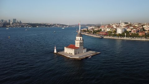 Awesome aerial view of the Maiden's Tower (Leander's Tower) and the Bosporus in Istanbul, Turkey. Drone flying over the Bosporus. Istanbul is a popular tourist destination in the world.