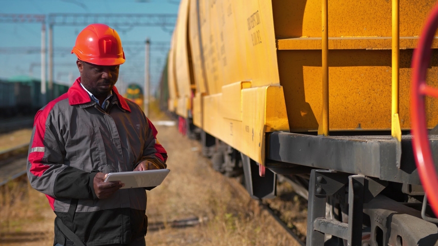 inspector wagons freight train station makes Stock Footage Video (100% ...