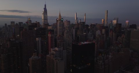 Slide and pan footage of skyscrapers in midtown. One Vanderbilt, Chrysler and Empire State Building. Manhattan, New York City, USA in 2021