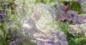 Composite video of flowers in the garden against caucasian woman keeping plant pots in a basket. community garden week awareness concept