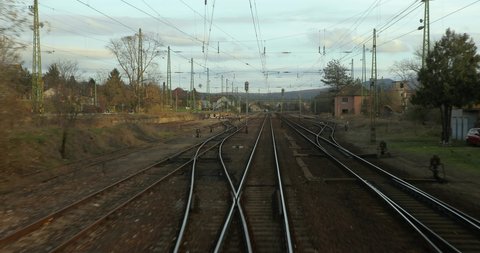 Train journey point of view from driver's view on the railway tracks