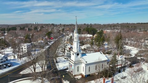 Lexington historic town center aerial view in winter including Massachusetts Avenue, Lexington Common and First Parish Church, town of Lexington, Massachusetts MA, USA. 