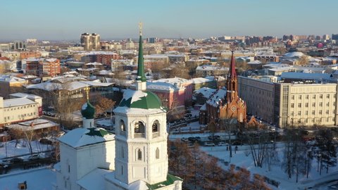 Aerial around view of the Spasskaya Church of our saviour, the oldest brick-and-stone edifice in east Siberia, Irkutsk, Russia, 4k