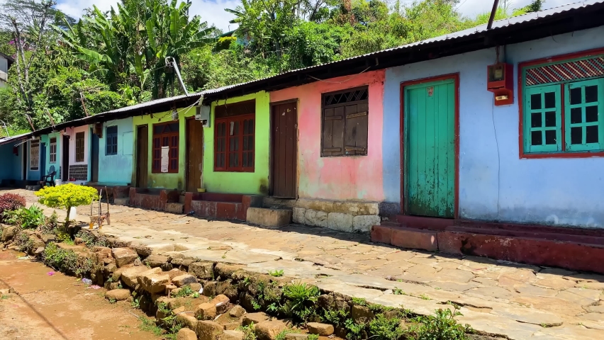 Sri Lanka moutain village at knuckles with colorful houses pan