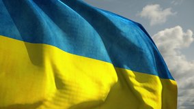 Slow motion of Ukrainian flag wind waving against the sky. Blue and yellow national symbol of Ukraine. Concept of peace and support of Ukraine against Russian agression and war. Highly detailed 4k - Powered by Shutterstock - Get 15% off with code: PIKWIZARD15