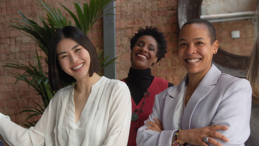 Slow motion of cheerful multiethnic businesswomen laughing and smiling, supporting International Women's Day | Shutterstock HD Video #1089144047