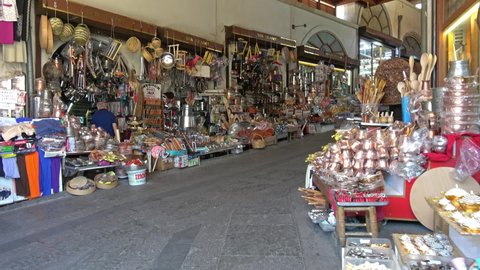 Kahramanmaras, Turkey - 18th of June 2021: 4K Strip mall with authentic goods in passage way
