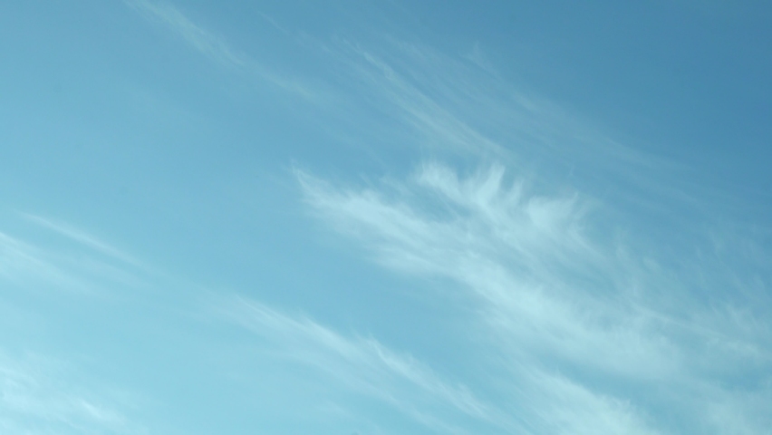 Clear Azure Blue Sky with Soaring Light Cirrus White Clouds on Sunny Day, Slow Motion, Time Lapse, Beauty, Relax, Atmosphere, Clear Azone Layer. Light Clouds in Pure Sky Beautiful View, Timelapse. Royalty-Free Stock Footage #1089146695