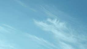 Clear Azure Blue Sky with Soaring Light Cirrus White Clouds on Sunny Day, Slow Motion, Time Lapse, Beauty, Relax, Atmosphere, Clear Azone Layer. Light Clouds in Pure Sky Beautiful View, Timelapse. - Powered by Shutterstock - Get 15% off with code: PIKWIZARD15