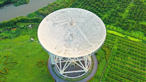 Aerial footage of astronomical radio telescope. Radio telescopes are used in science for space observation and distant objects exploring.