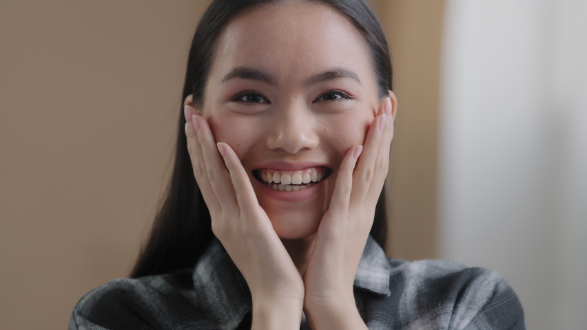 Close up surprised female face oh my god wow expression amazed excited asian happy woman looking at camera shocked by victory triumph good news euphoric korean girl winning bid getting offer success Royalty-Free Stock Footage #1089151163