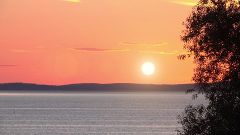 Beautiful scenic nature background of lake in sunset. Summer in Sweden.
