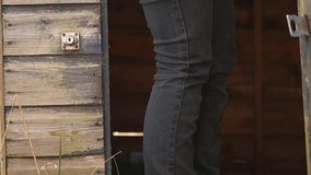 Worker in hi visibility jackets sits down in shed medium slow motion shot - Powered by Shutterstock - Get 15% off with code: PIKWIZARD15