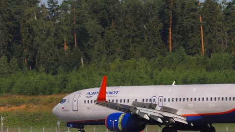 MOSCOW, RUSSIAN FEDERATION - JULY 30, 2021: Boeing 737 Aeroflot brakes with open flaps after landing at Sheremetyevo. Aircraft arrival. Airplane, cockpit view