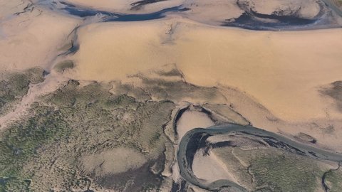 Aerial view at low tide of the Agüera estuary in the surroundings of the town of Oriñon. Castro Municipality, Cantabrian Sea, Cantabria, Spain, Europe