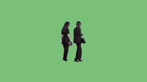 Two beautiful young women in business black suits are walking together. Transparent background. Perspective view. 85mm lens