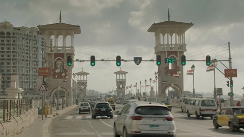 Alexandria - Egypt, 10 November 2021 : Green traffic light on Stanley Bridge in Alexandria Egypt