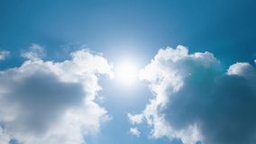 Low angle timelapse bright sun on blue summer sky with moving fluffy clouds, sun shining sunbeams, white cumulus clouds on sunshine day. Time-lapse, sun rays daylight, sunny cloudscape - Powered by Shutterstock - Get 15% off with code: PIKWIZARD15