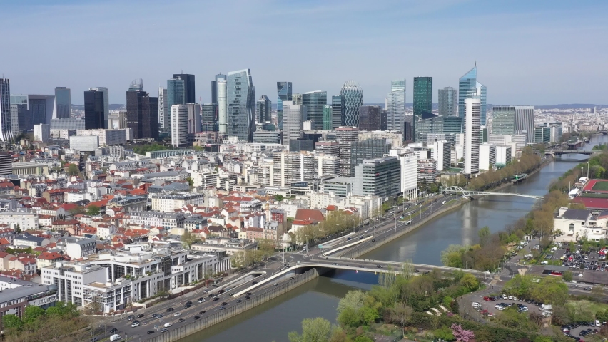 France, Paris, Puteaux city with Paris La Defense, the parisian business district "French Manhattan", in the background, drone aerial view. Royalty-Free Stock Footage #1089168727