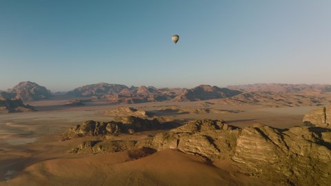 Hot Air Balloon On Flight Over Wadi Rum Desert In Jordan. Wide Shot