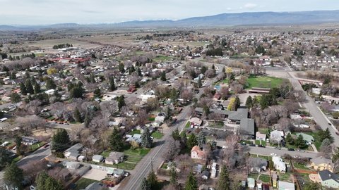 Cinematic 4K aerial drone footage of residential neighborhood by Central Washington University in the city of Ellensburg, Kittitas County in Western Washington