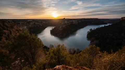 Motion timelaspe of a colourful sunset at the Hoces del Río Duratón National Park in Spain
